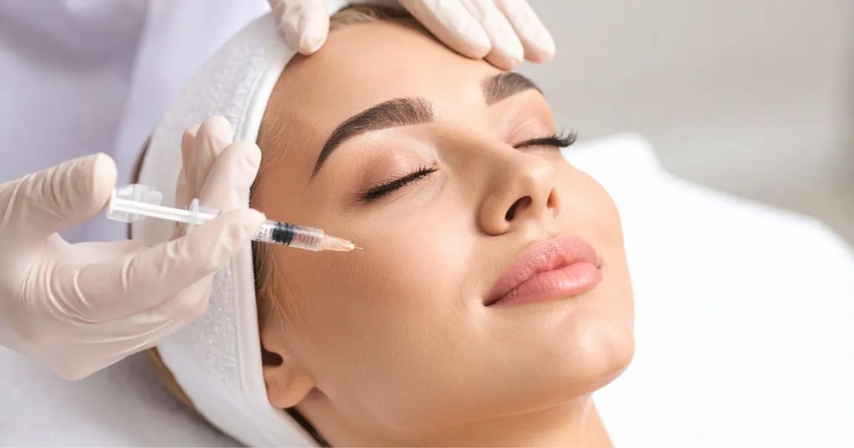 Woman receiving neurotoxins facial injection in Murrysville PA clinic